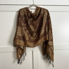 New With Tags Add A Touch Of Elegance To Your Outfit With This Beautiful Bijoux Terner Shawl Scarf. The Camel And Brown Paisley Pattern With Gold Undertones Gives It A Unique And Sophisticated Look. This Scarf Is A Must-Have For Any Fashion-Conscious Woman And Is Sure To Become A Cherished Addition To Your Wardrobe. 100%Polyester Bohemian Brown Shawl With Paisley Print, Fall Paisley Print Pashmina Shawl, Mustard Scarf, Gold Shawl, Statement Scarf, Patchwork Scarf, Michael Kors Scarf, Brown Paisley, Embroidered Scarf