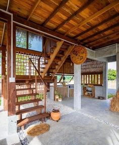 the inside of a house with wooden stairs