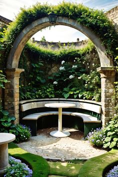 a bench in the middle of a garden surrounded by greenery and stone archways