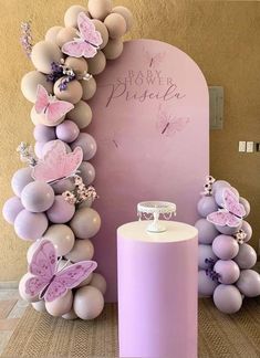 balloons and decorations are arranged in the shape of butterflies