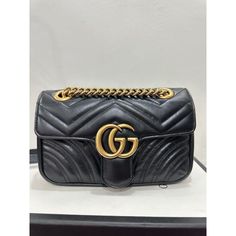 New with tags: A brand-new, unused, and unworn item (including handmade items) in the original packaging (such as the original box or bag) and/or with the original tags attached. Gucci GG Marmont Shoulderbag Matelasse Gold Black Leather Handbag Bag Purse New The small GG Marmont camera bag has a softly structured shape and a flap closure with Double G hardware. The sliding chain strap can be worn multiple ways, changing between a shoulder and a top handle bag. Made in matelassé chevron leather with a heart on the back. Features Points: Antique gold-toned hardwareInterior zipper pocketFlap with spring closureThe Gucci card case wallet will fit inside this productThe model is 178cmMicrofibre lining with a suede-like finish Dimension: 10"W x 6"H x 3"DWeight: 1.42lbs Materials and Care: Gucci