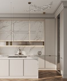 a white kitchen with marble counter tops and cabinets in the center, along with wooden flooring