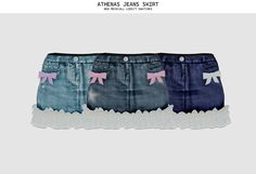 three pairs of denim shorts with bows and laces on the bottom, two are blue and one is pink