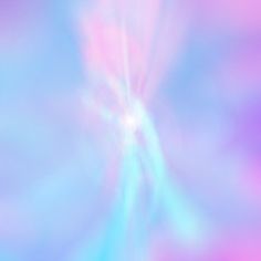 an abstract image of blue, pink and green colors with light streaks in the middle