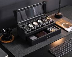 .Introducing Our Custom Watch Box for Men: Enhance your timepiece and accessory organization with our Custom Watch Box for Men. This 6-slot leather case with a single drawer offers a sophisticated solution for storing watches, sunglasses, and other essentials. Personalized gifts for men are made even more special with engraving options available, making it an ideal groomsman gift or best man gift for any occasion. ▷ CUSTOMIZED DESIGN: Make a statement with our custom watch box, featuring a sleek Men’s Jewelry Box, Watch Collection Display, Storing Sunglasses, Watch Box For Men, Leather Watch Case, Mens Watch Box, Watch Display Case, Dresser Top, Collection Display