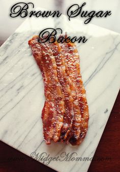 bacon on a marble plate with the words brown sugar bacon