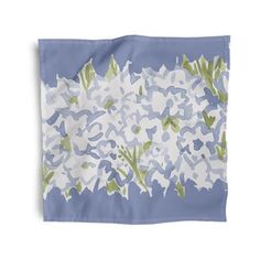 a blue and white napkin with flowers on it