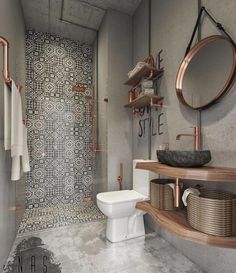 a bathroom with a toilet, sink and shower in it's own area is shown