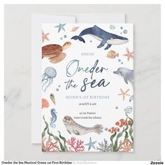 an ocean themed birthday party with sea animals and marine life on the front, under the sea