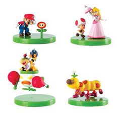 mario and friends figurines are on display in the shape of toy figures,