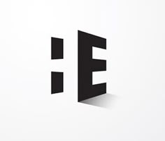 the letter e is made up of black letters and shadows on a white background with shadow