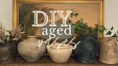 some vases are sitting on a shelf with the words diy aged vases