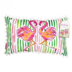 a pink flamingo pillow with pom - poms on the front and back