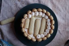 a cake decorated with marshmallows and cookies