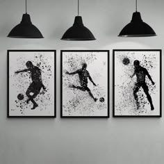 three black and white pictures hanging on the wall