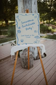 a sign that is on top of a wooden easel