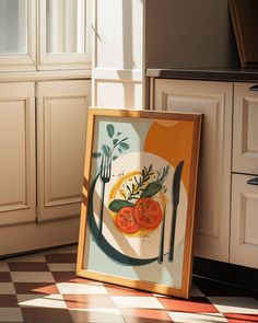 a plate with two tomatoes on it sitting next to a knife and fork in front of a window