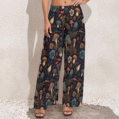 Embrace the magic of nature with these mushroom, witchy, and cottagecore inspired boho wide leg pants. Crafted from 100% polyester, these pants are lightweight, breathable, and perfect for summer wear. The high-waisted design flatters your figure, elongating your legs and giving you a chic, flowy look that's perfect for casual outings or lounging at home. Versatile and stylish, these pants pair perfectly with short tops, shirts, or tees. They make a thoughtful gift for any occasion, whether it's Witchy Cottagecore, Casual Summer Pants, Womens Wide Leg Pants, Womens Trousers, Casual Home, Summer Pants, Pantalon Large, Boho Women, Look Chic