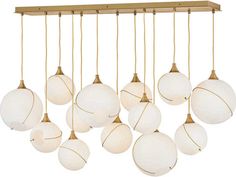 a bunch of white balls hanging from a light fixture