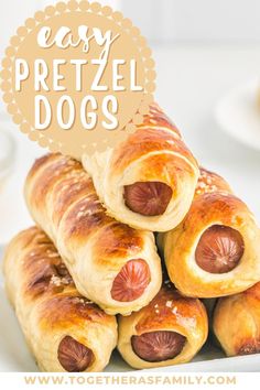 a pile of pigs in a blanket on top of a white plate with the words easy pretzel dogs