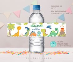 a water bottle label with dinosaurs on it and confetti around the edges