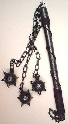 a pen and chain with spikes attached to it