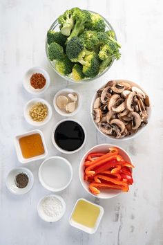 the ingredients to make broccoli and mushroom soup are displayed in bowls on a white surface