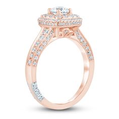 a rose gold engagement ring with two rows of diamonds on the band and an oval center stone