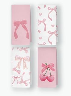 four pink napkins with bows and cherries on them, one has a bow