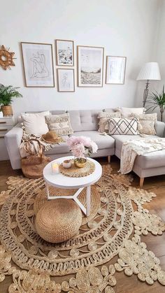 a living room filled with lots of furniture and pictures on the wall above it's coffee table