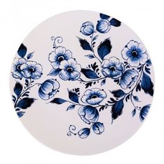 a blue and white plate with flowers on it