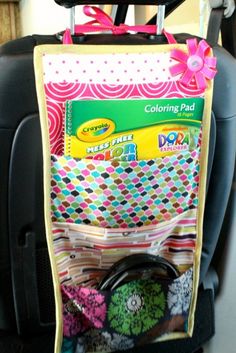 the back seat pocket is filled with colorful items