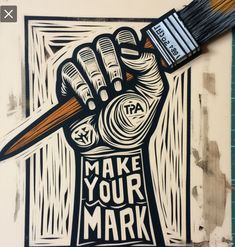 a hand holding a paintbrush with the words make your mark painted on it,