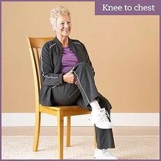 an older woman sitting in a chair with her legs crossed and smiling at the camera