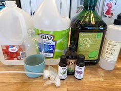 the ingredients to make homemade diy hand soap are displayed on a wooden countertop