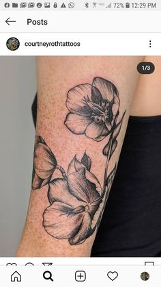 a woman's arm with a flower tattoo on the left side of her body