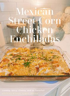 mexican street corn chicken enchiladas in a glass dish on top of a stove