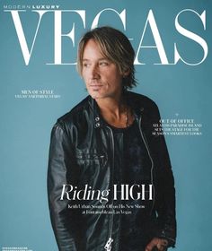 a man in black jacket on the cover of a magazine