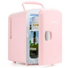 an open pink mini fridge with two bottles in it