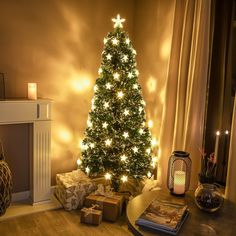 a lit christmas tree in a living room