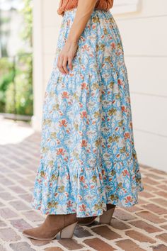 You are going to love when you get to start the day with this maxi skirt! That pattern is so pretty and we love the colors! This maxi skirt is perfect for the fall! Elastic waist Tiered Floral print No stretch Baileigh is wearing the small. Bohemian Maxi Skirt With Elastic Waistband For Day Out, Bohemian Maxi Dress With Gathered Skirt, Blue Gathered Maxi Skirt For Summer, Bohemian Spring Maxi Dress With Relaxed Skirt, Bohemian Relaxed Skirt Maxi Dress For Spring, Bohemian Maxi Dress With Relaxed Skirt For Spring, Vacation Gathered Maxi Skirt, Day Out Floral Print Maxi Skirt, Beach Maxi Skirt With Gathered Detail