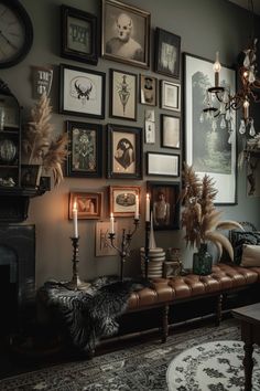 a living room filled with furniture and pictures on the wall