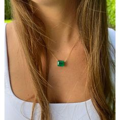 Introducing this Vivid Green Colombian Emerald connecting choker necklace set in 18k solid yellow gold. The pendant seamlessly integrates with the cable chain in what's known as a 'floating' solitaire pendant necklace. The chain necklace features 2 closure holes that allow for an adjustable length on the neck.   This gem displays a very fine, richly saturated vivid green color that is representative of top-quality emeralds. Finely cut to enhance the overall visual appeal and optimize color refraction. Fine quality emeralds in excess of 8 carats are quite rare, and the combination of origin and quality elements for this emerald signifies a gemstone worthy of distinction.   Stationed on an elegant 4-prong basket solitaire mounting. Stamped '750' on the clasp. Video Link: https://youtube.com/ Chanel Flower, Vintage Beads Necklace, Peridot Necklace, Solitaire Pendant Necklace, Heart Necklace Diamond, Gold Cross Necklace, Choker Necklace Set, Circle Diamond, Colombian Emeralds