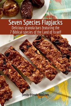 seven species of flapjacks on a plate with dates and figs in the background