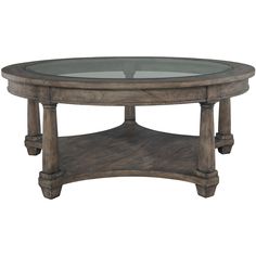 an oval glass table with wooden legs