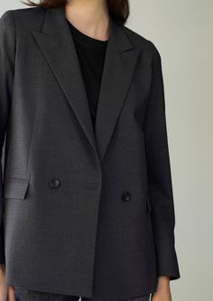 PREORDER EXCLUSIVE. Delivery December 10. Double breasted dark gray blazer in italian wool lightweight fabric. Sharp glamour made with 100% Italian wool fabric at our atelier. The fit is flawless. Wear it with jeans and sneakers over the weekend or with tailored pants at the office for a sharp look. Italian Fabric Composition. 100% wool Made in USA Lightweight Fully lined in silky viscose fabric Front real pockets with flap Fits true to size Gray Lapel Collar Suit For Fall, Gray Blazer With Pressed Crease For Work, Gray Blazer With Pressed Crease For Office, Timeless Gray Blazer For Business Casual, Gray Fall Workwear Suits, Gray Fall Suits For Work, Gray Suits For Fall Workwear, Gray Office Blazer With Pressed Crease, Gray Blazer With Welt Pockets For Work