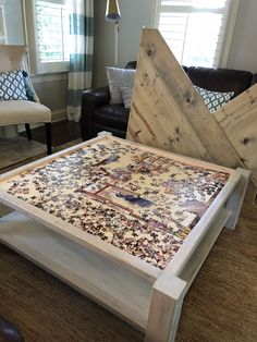 a table made out of pieces of wood sitting on top of a carpeted floor