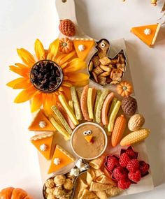 a turkey shaped platter filled with snacks