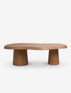 an oval wooden table on a white background