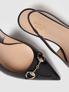 Find GUCCI 45mm Leather Horsebit Slingback Pumps on Editorialist. 45mm Heel. Black leather upper. Slingback strap with elastic insert. Metal Horsebit detail. Gold-toned metal hardware . Pointed toe. Topstitch detail. Leather sole Gucci Slingback Pumps For Work, Gucci Luxury Slingback Pumps For Work, Gucci Leather Slingback Pumps For Work, Gucci Slingback Heels For Work, Gucci Slingback Heels For Office, Luxury Black Slingback Pumps With Buckle, Luxury Black Slingback Pumps With Buckle Closure, Gucci Ankle Strap Heels With Gold-tone Hardware, Black Leather Gucci Slingback Pumps